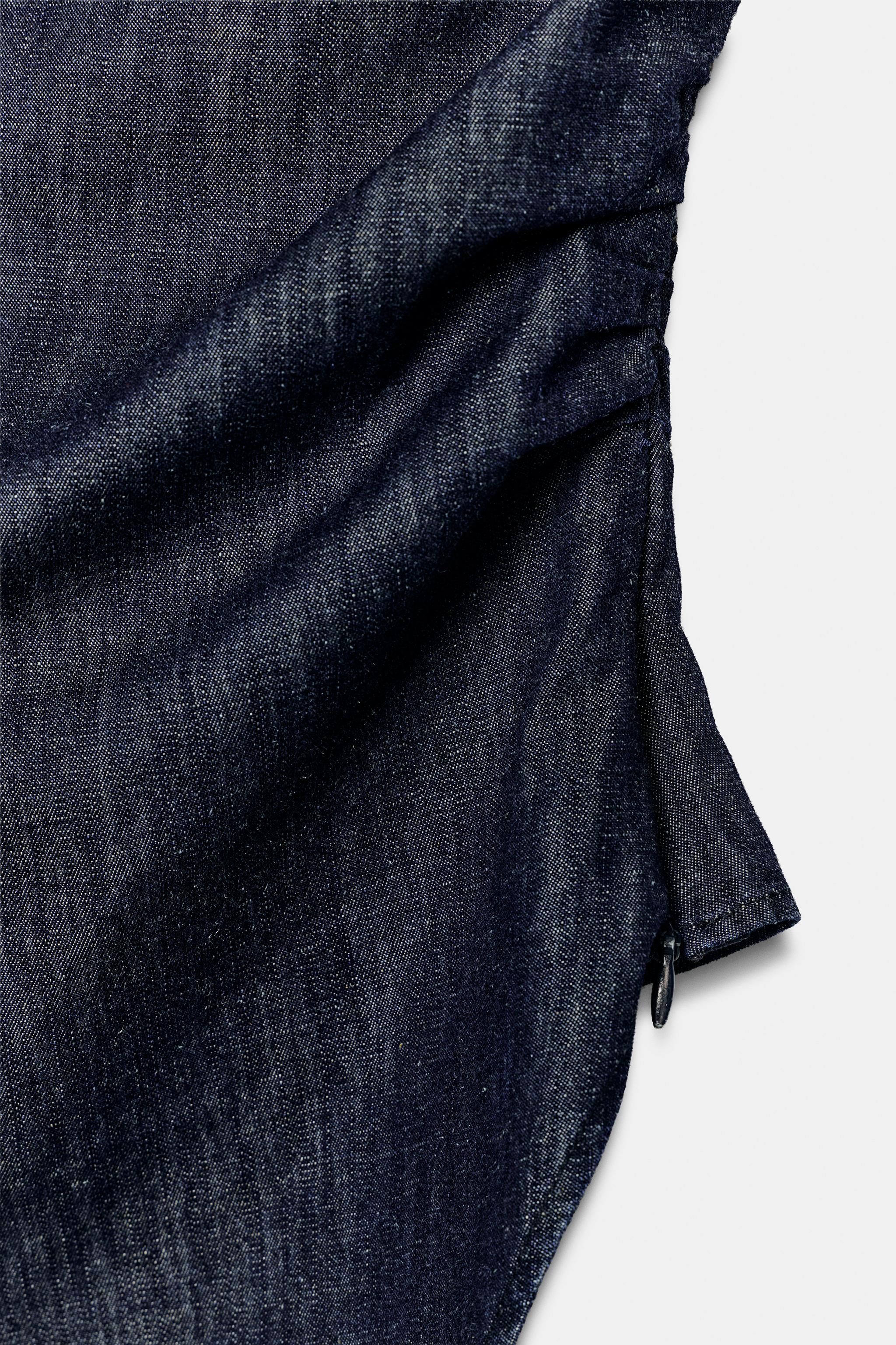ASYMMETRIC SHOULDER PAD LINEN BLEND TOP